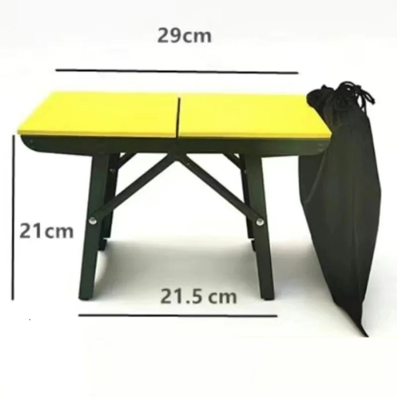 a yellow desk with a yellow umbrella on it