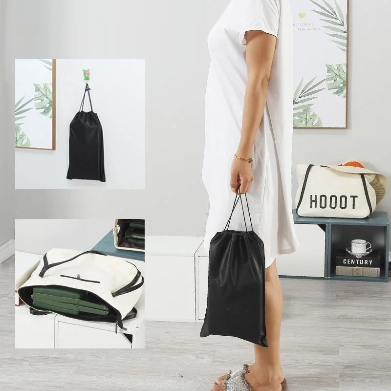 a woman is playing a video game in a room