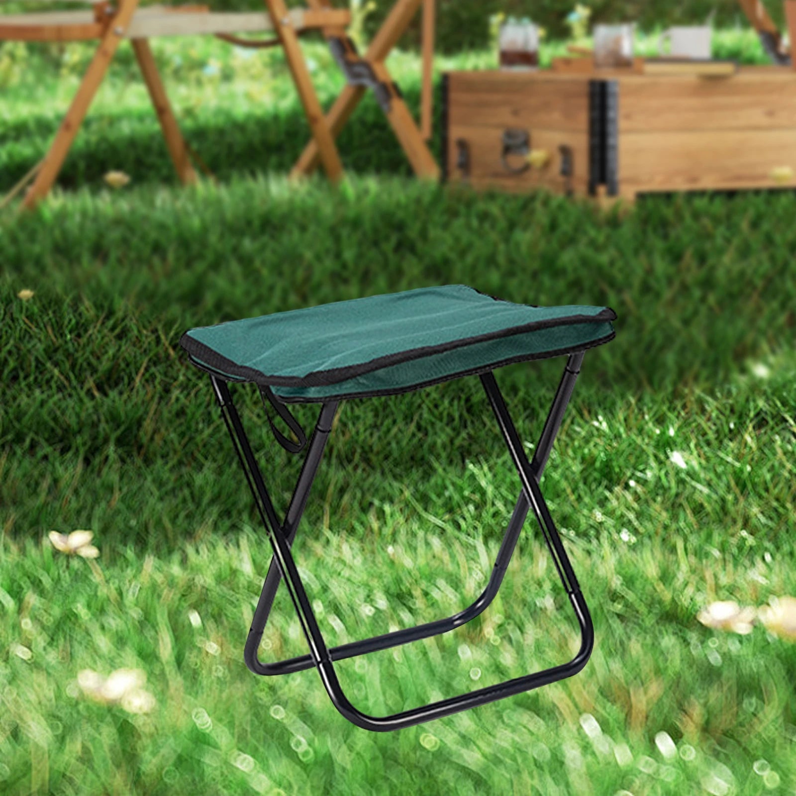 a blue lawn chair sitting in the grass