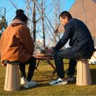a couple of people sitting on a bench