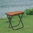 a chair with an umbrella on top of it