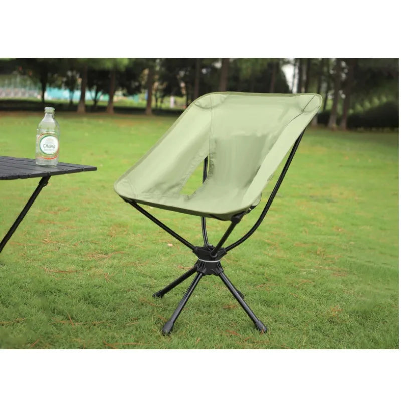 a kite is being flown on a grassy field