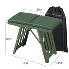 a green piece of luggage sitting on top of a box