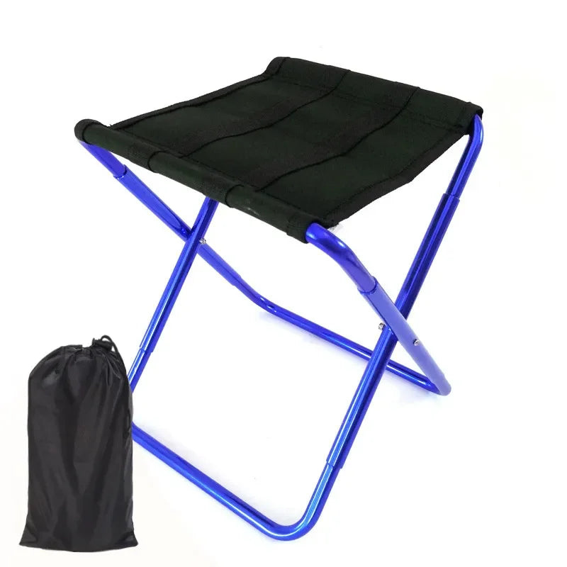 a blue umbrella sitting on top of a table