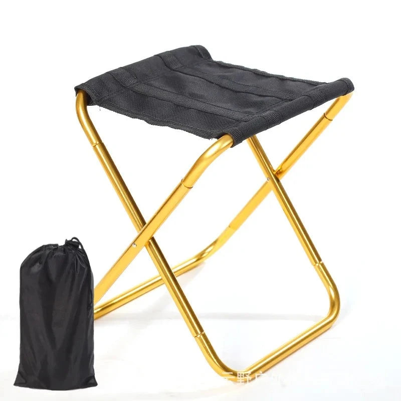 a black and yellow umbrella on a white surface