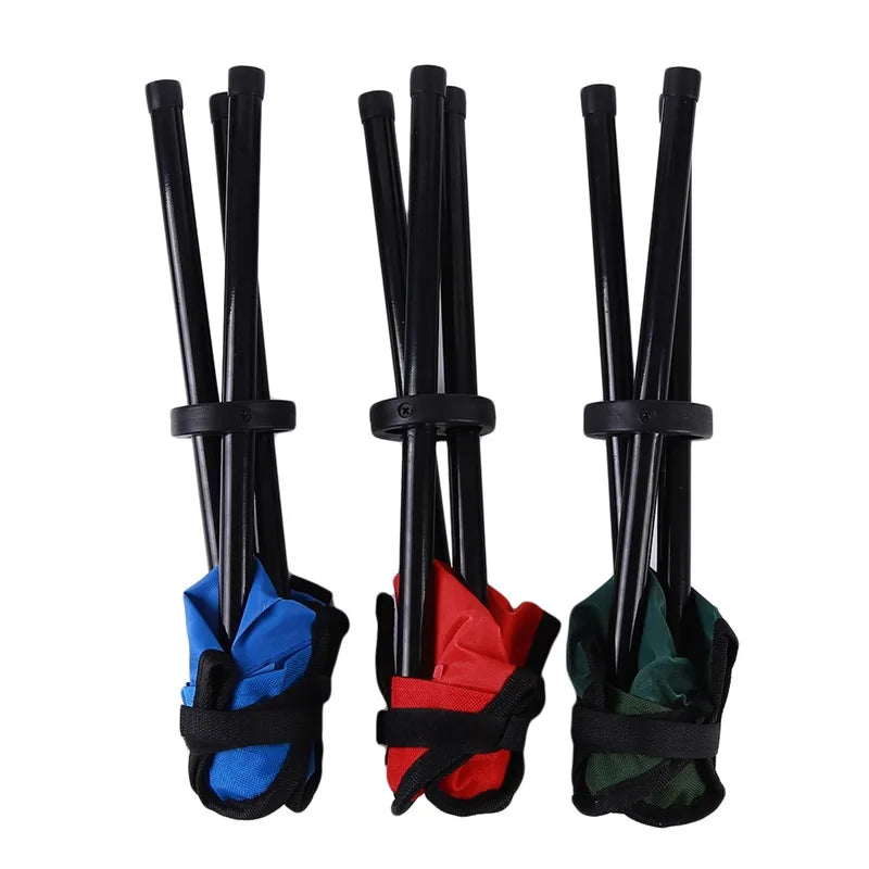 a bunch of skis are hanging on a rack