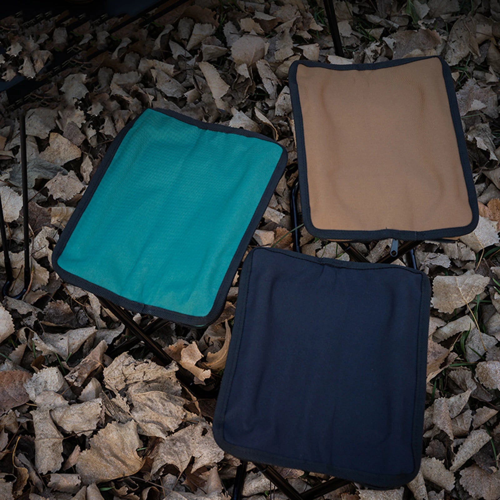 a suitcase and a bag sitting on the ground