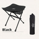 a black chair with a black suitcase on it 