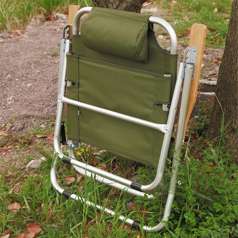 a green piece of luggage sitting on the ground 